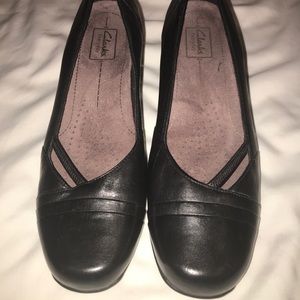Clark’s Black Leather pumps.